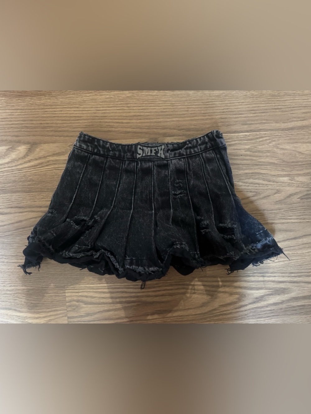 WILDERNESS WANDERING BLACK PLEATED SHORT SKIRT with shorts under